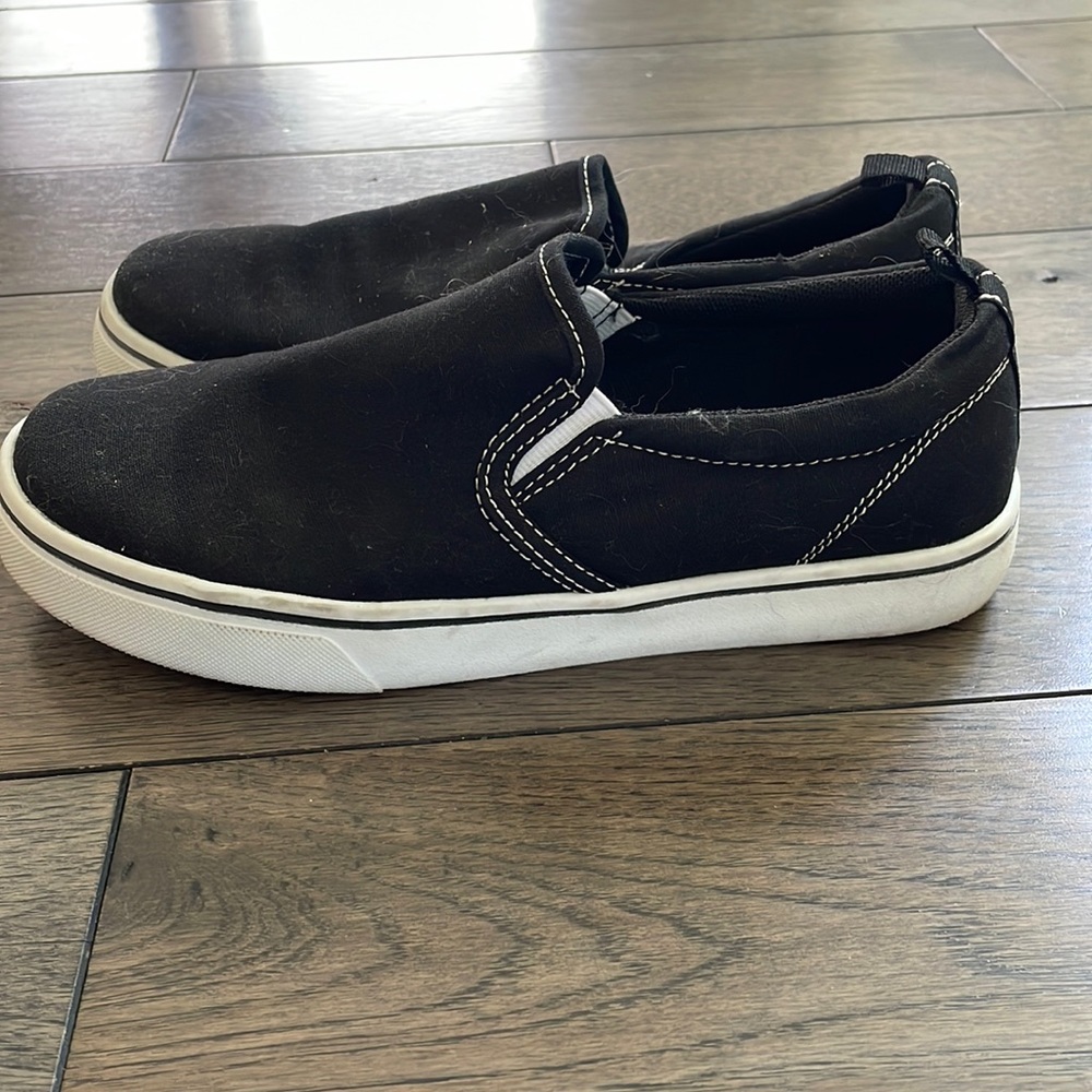Barely worn black canvas slip on shoes